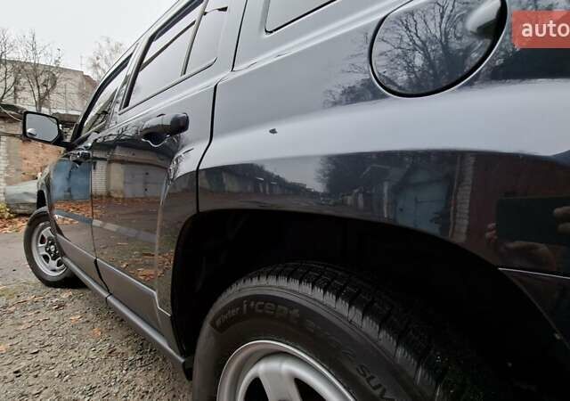 Черный Джип Патриот, объемом двигателя 2.36 л и пробегом 187 тыс. км за 10800 $, фото 14 на Automoto.ua