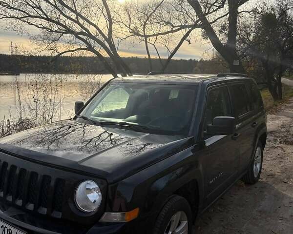 Черный Джип Патриот, объемом двигателя 2.36 л и пробегом 144 тыс. км за 10500 $, фото 5 на Automoto.ua