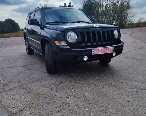 Черный Джип Патриот, объемом двигателя 2.4 л и пробегом 182 тыс. км за 10400 $, фото 2 на Automoto.ua