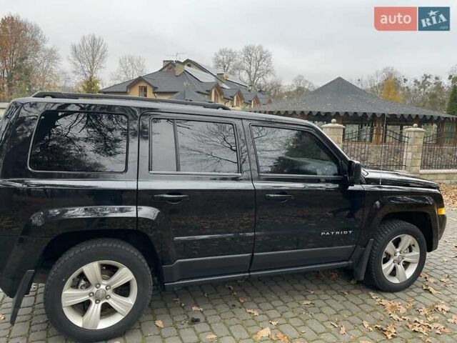 Черный Джип Патриот, объемом двигателя 2.4 л и пробегом 88 тыс. км за 10000 $, фото 3 на Automoto.ua