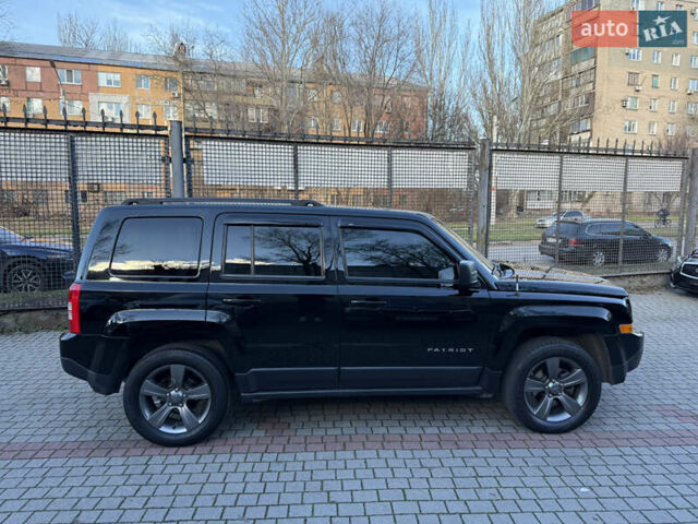 Чорний Джип Patriot, об'ємом двигуна 2.4 л та пробігом 128 тис. км за 10300 $, фото 7 на Automoto.ua