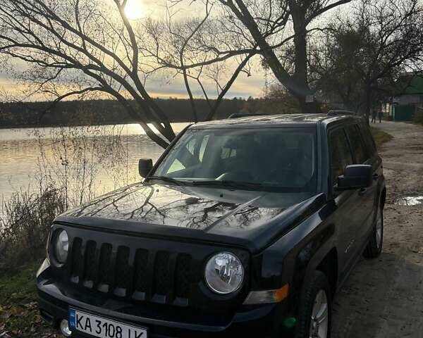 Черный Джип Патриот, объемом двигателя 2.36 л и пробегом 144 тыс. км за 10500 $, фото 2 на Automoto.ua