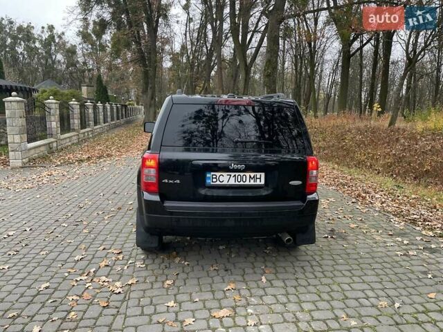 Черный Джип Патриот, объемом двигателя 2.4 л и пробегом 88 тыс. км за 10000 $, фото 2 на Automoto.ua