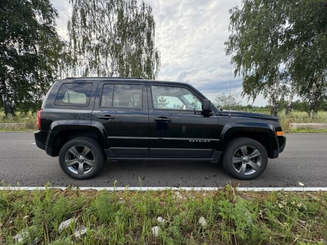 Черный Джип Патриот, объемом двигателя 2.4 л и пробегом 169 тыс. км за 11100 $, фото 3 на Automoto.ua