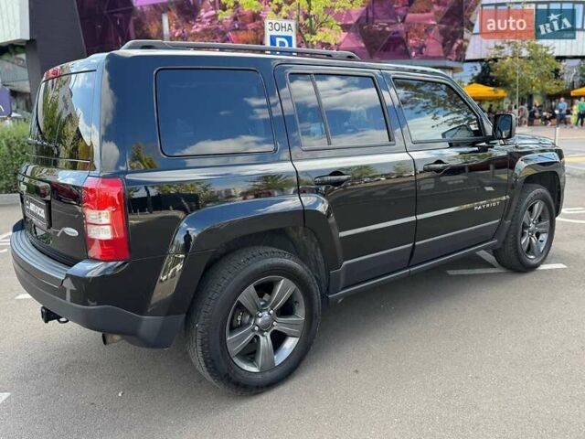 Чорний Джип Patriot, об'ємом двигуна 2.36 л та пробігом 123 тис. км за 10690 $, фото 6 на Automoto.ua