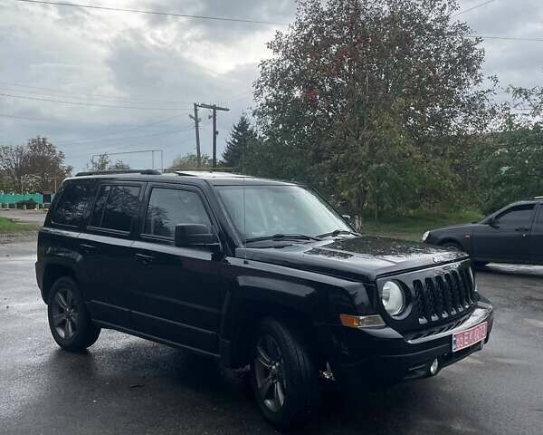 Черный Джип Патриот, объемом двигателя 2.4 л и пробегом 182 тыс. км за 10400 $, фото 17 на Automoto.ua