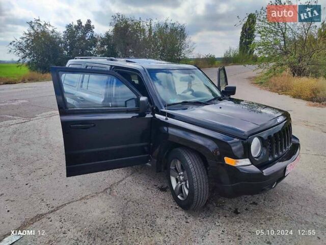 Черный Джип Патриот, объемом двигателя 2.4 л и пробегом 182 тыс. км за 10400 $, фото 22 на Automoto.ua