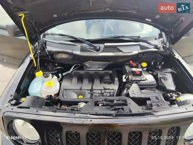 Черный Джип Патриот, объемом двигателя 2.4 л и пробегом 182 тыс. км за 10400 $, фото 23 на Automoto.ua