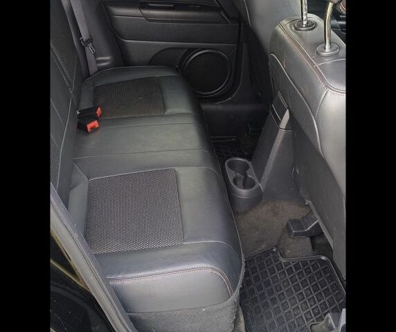 Чорний Джип Patriot, об'ємом двигуна 2 л та пробігом 93 тис. км за 12000 $, фото 7 на Automoto.ua