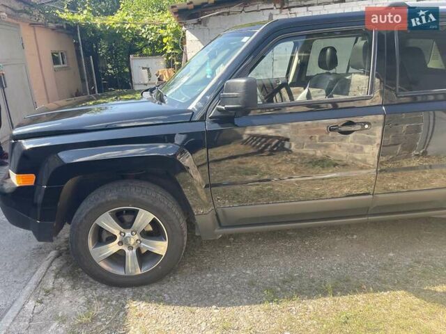 Черный Джип Патриот, объемом двигателя 2.36 л и пробегом 157 тыс. км за 11300 $, фото 3 на Automoto.ua