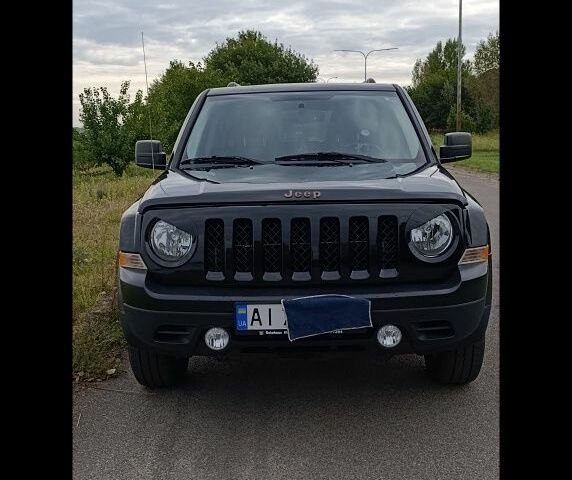 Чорний Джип Patriot, об'ємом двигуна 2 л та пробігом 93 тис. км за 12000 $, фото 1 на Automoto.ua