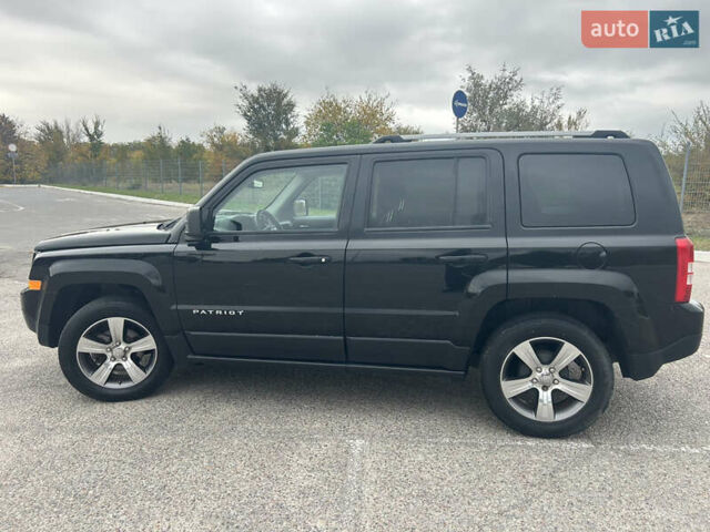 Чорний Джип Patriot, об'ємом двигуна 2 л та пробігом 153 тис. км за 12500 $, фото 4 на Automoto.ua