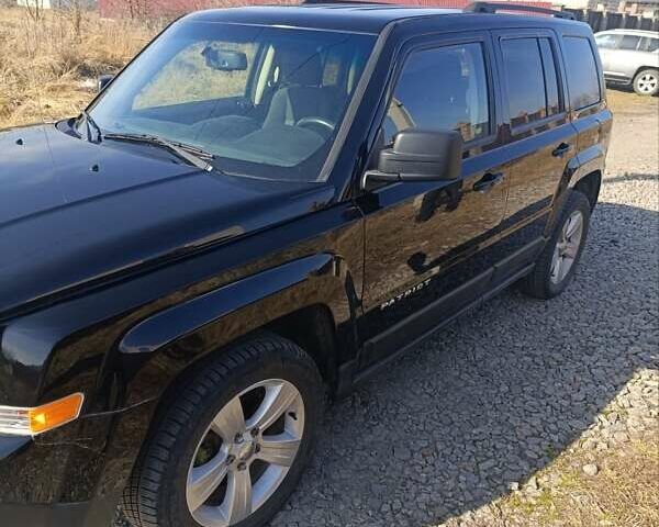 Чорний Джип Patriot, об'ємом двигуна 2 л та пробігом 180 тис. км за 11900 $, фото 6 на Automoto.ua
