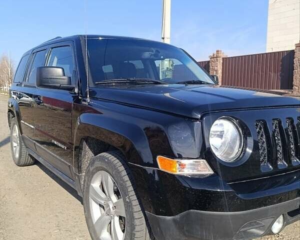 Чорний Джип Patriot, об'ємом двигуна 2 л та пробігом 180 тис. км за 11900 $, фото 11 на Automoto.ua