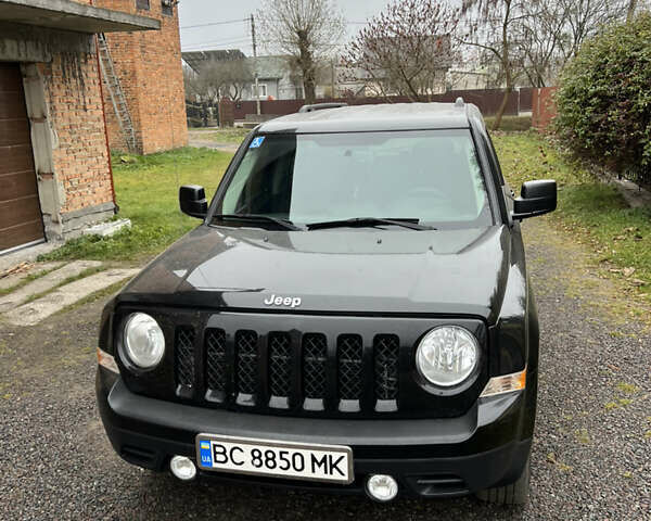 Черный Джип Патриот, объемом двигателя 2.36 л и пробегом 167 тыс. км за 10200 $, фото 2 на Automoto.ua