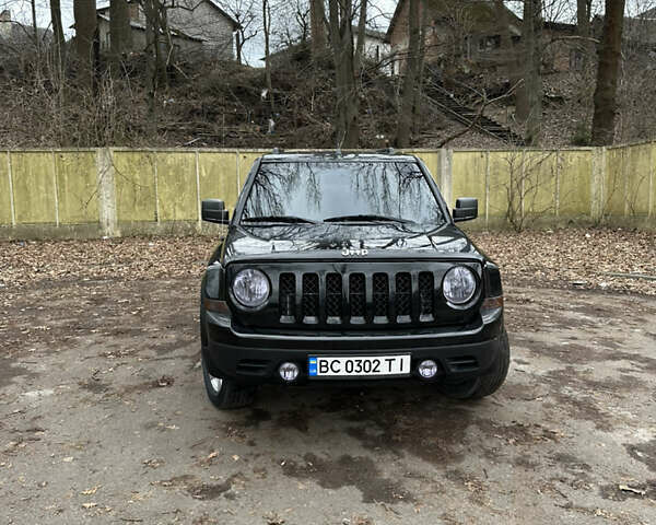 Черный Джип Патриот, объемом двигателя 2.36 л и пробегом 32 тыс. км за 11200 $, фото 6 на Automoto.ua