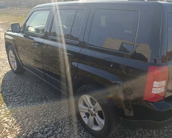 Чорний Джип Patriot, об'ємом двигуна 2 л та пробігом 180 тис. км за 11900 $, фото 2 на Automoto.ua