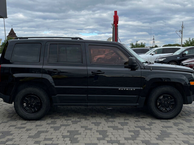 Черный Джип Патриот, объемом двигателя 2.4 л и пробегом 200 тыс. км за 9800 $, фото 7 на Automoto.ua