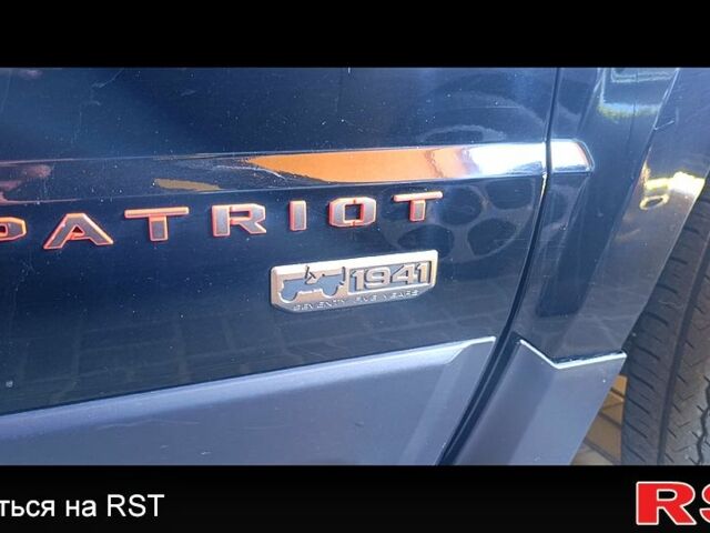 Черный Джип Патриот, объемом двигателя 2.4 л и пробегом 93 тыс. км за 12000 $, фото 2 на Automoto.ua