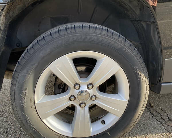 Черный Джип Патриот, объемом двигателя 2.36 л и пробегом 99 тыс. км за 11500 $, фото 3 на Automoto.ua