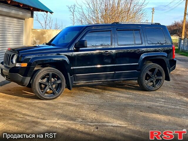 Черный Джип Патриот, объемом двигателя 2 л и пробегом 114 тыс. км за 11500 $, фото 1 на Automoto.ua