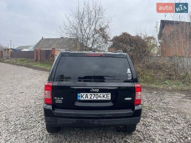Черный Джип Патриот, объемом двигателя 2.36 л и пробегом 192 тыс. км за 10900 $, фото 4 на Automoto.ua