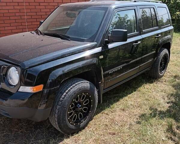 Чорний Джип Patriot, об'ємом двигуна 2 л та пробігом 50 тис. км за 13200 $, фото 23 на Automoto.ua