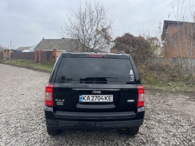 Черный Джип Патриот, объемом двигателя 2.4 л и пробегом 200 тыс. км за 10000 $, фото 4 на Automoto.ua
