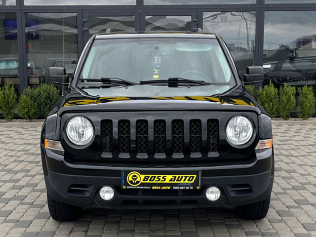 Черный Джип Патриот, объемом двигателя 2.4 л и пробегом 200 тыс. км за 9800 $, фото 1 на Automoto.ua