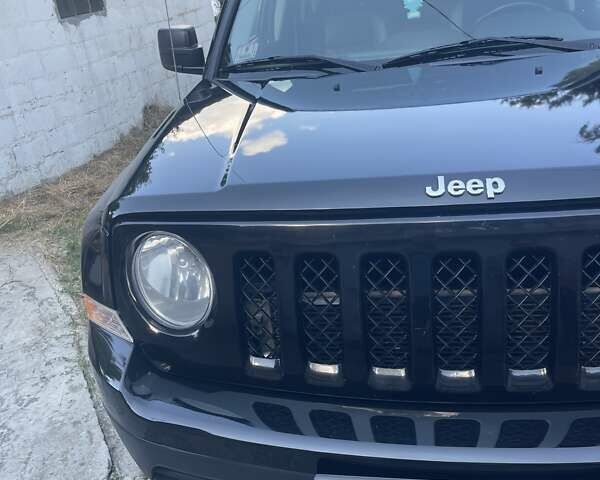 Черный Джип Патриот, объемом двигателя 2.36 л и пробегом 157 тыс. км за 11300 $, фото 11 на Automoto.ua
