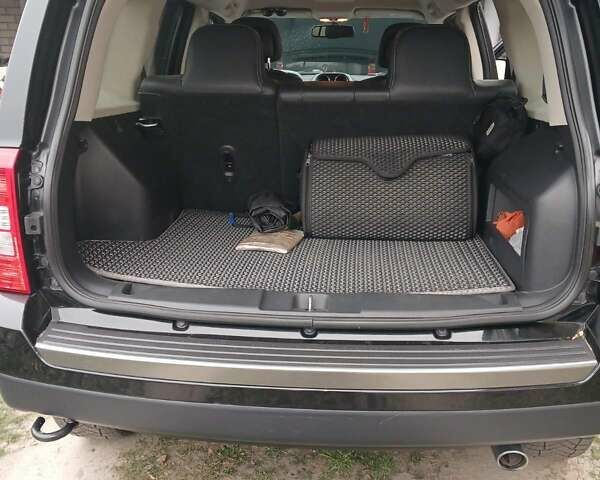 Чорний Джип Patriot, об'ємом двигуна 2.36 л та пробігом 63 тис. км за 12000 $, фото 7 на Automoto.ua