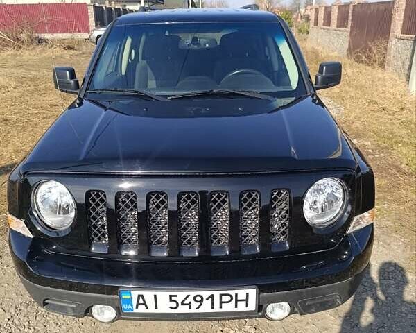 Чорний Джип Patriot, об'ємом двигуна 2 л та пробігом 180 тис. км за 11900 $, фото 5 на Automoto.ua
