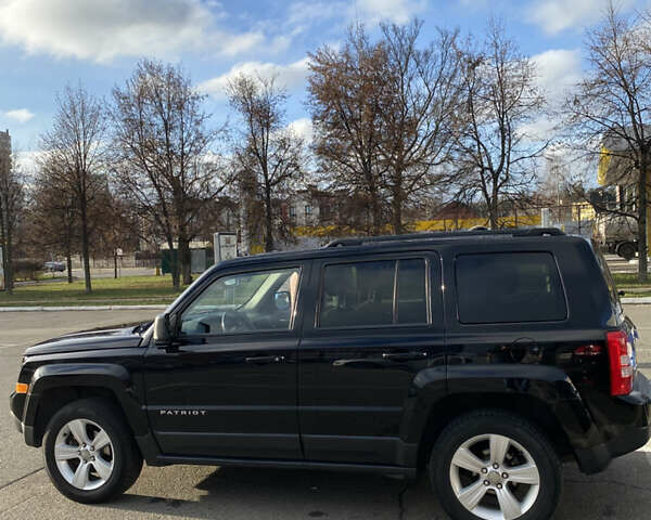 Черный Джип Патриот, объемом двигателя 2.36 л и пробегом 99 тыс. км за 11500 $, фото 6 на Automoto.ua