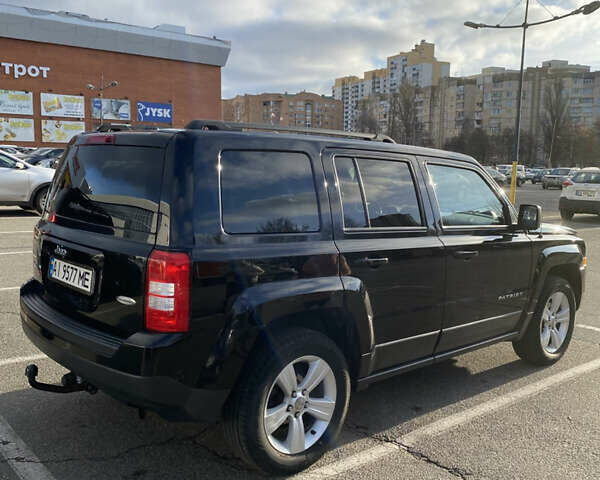 Черный Джип Патриот, объемом двигателя 2.36 л и пробегом 99 тыс. км за 11500 $, фото 2 на Automoto.ua