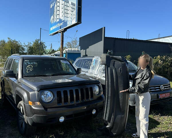 Черный Джип Патриот, объемом двигателя 2.4 л и пробегом 155 тыс. км за 9200 $, фото 1 на Automoto.ua