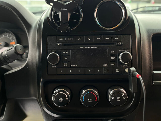 Черный Джип Патриот, объемом двигателя 2.4 л и пробегом 200 тыс. км за 9800 $, фото 20 на Automoto.ua