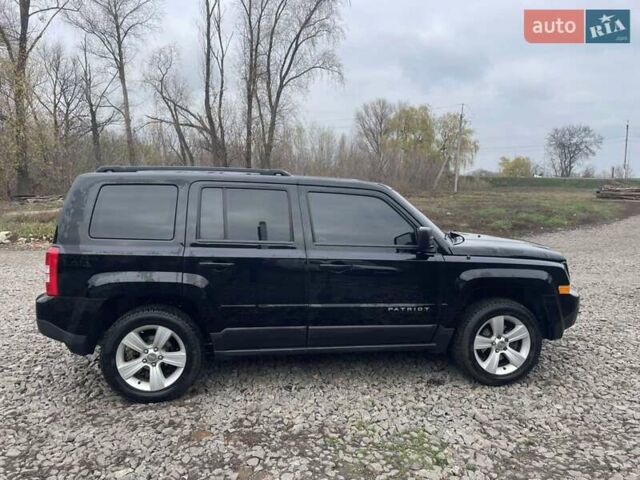Черный Джип Патриот, объемом двигателя 2.36 л и пробегом 192 тыс. км за 10900 $, фото 6 на Automoto.ua