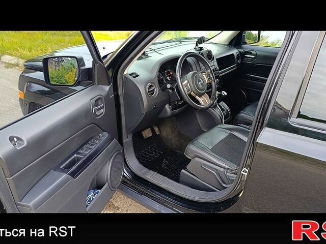 Черный Джип Патриот, объемом двигателя 2.4 л и пробегом 93 тыс. км за 12000 $, фото 6 на Automoto.ua