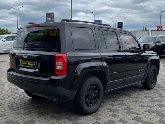 Черный Джип Патриот, объемом двигателя 2.4 л и пробегом 200 тыс. км за 9800 $, фото 6 на Automoto.ua