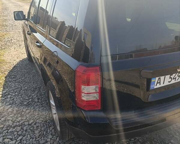 Чорний Джип Patriot, об'ємом двигуна 2 л та пробігом 180 тис. км за 11900 $, фото 12 на Automoto.ua