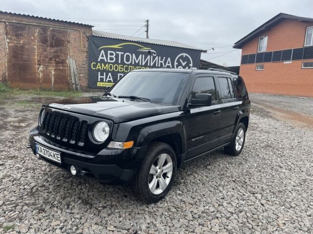 Черный Джип Патриот, объемом двигателя 2.4 л и пробегом 200 тыс. км за 10000 $, фото 2 на Automoto.ua