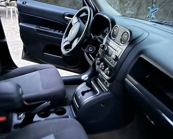 Черный Джип Патриот, объемом двигателя 2.36 л и пробегом 32 тыс. км за 11200 $, фото 5 на Automoto.ua