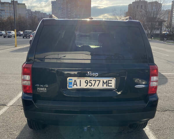 Черный Джип Патриот, объемом двигателя 2.36 л и пробегом 99 тыс. км за 11500 $, фото 1 на Automoto.ua