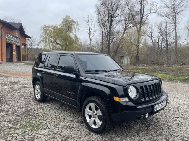 Черный Джип Патриот, объемом двигателя 2.4 л и пробегом 200 тыс. км за 10000 $, фото 1 на Automoto.ua