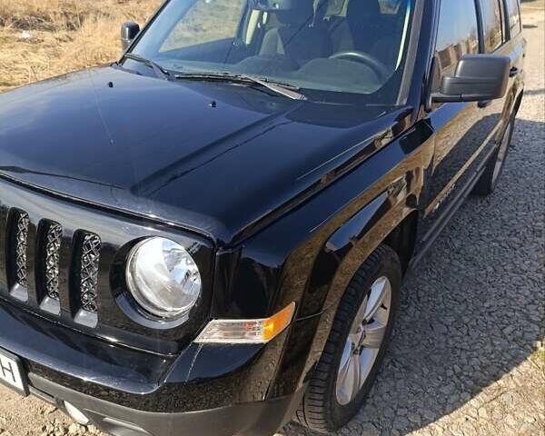 Чорний Джип Patriot, об'ємом двигуна 2 л та пробігом 180 тис. км за 11900 $, фото 1 на Automoto.ua