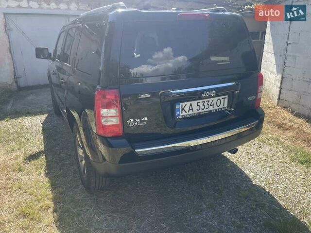 Черный Джип Патриот, объемом двигателя 2.36 л и пробегом 157 тыс. км за 11300 $, фото 2 на Automoto.ua