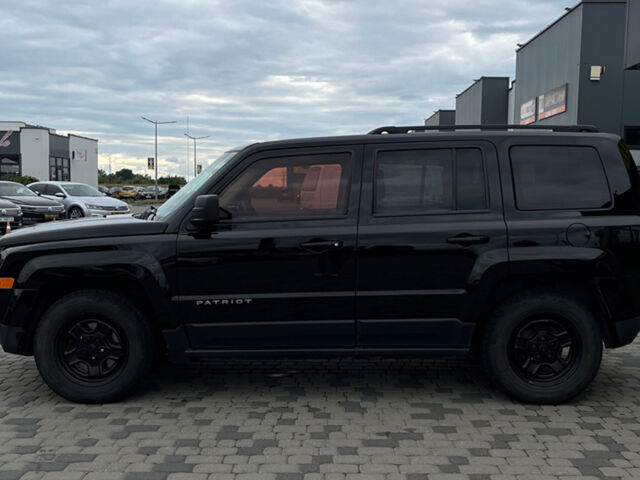 Черный Джип Патриот, объемом двигателя 2.4 л и пробегом 200 тыс. км за 9800 $, фото 3 на Automoto.ua