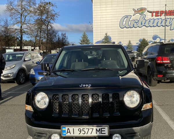 Черный Джип Патриот, объемом двигателя 2.36 л и пробегом 99 тыс. км за 11500 $, фото 4 на Automoto.ua
