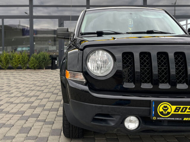 Черный Джип Патриот, объемом двигателя 2.4 л и пробегом 200 тыс. км за 9800 $, фото 8 на Automoto.ua