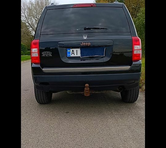 Черный Джип Патриот, объемом двигателя 2.4 л и пробегом 93 тыс. км за 12000 $, фото 4 на Automoto.ua